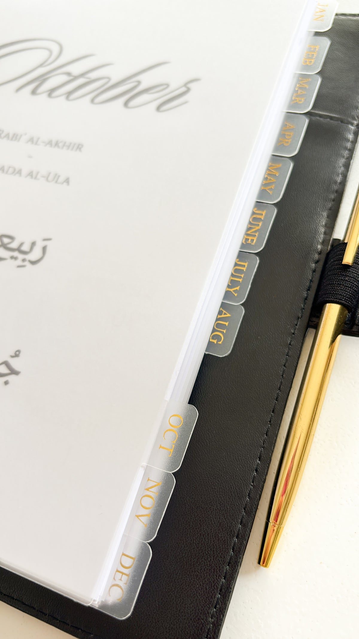 Monthly tabs and dividers for a planner binder, January to December