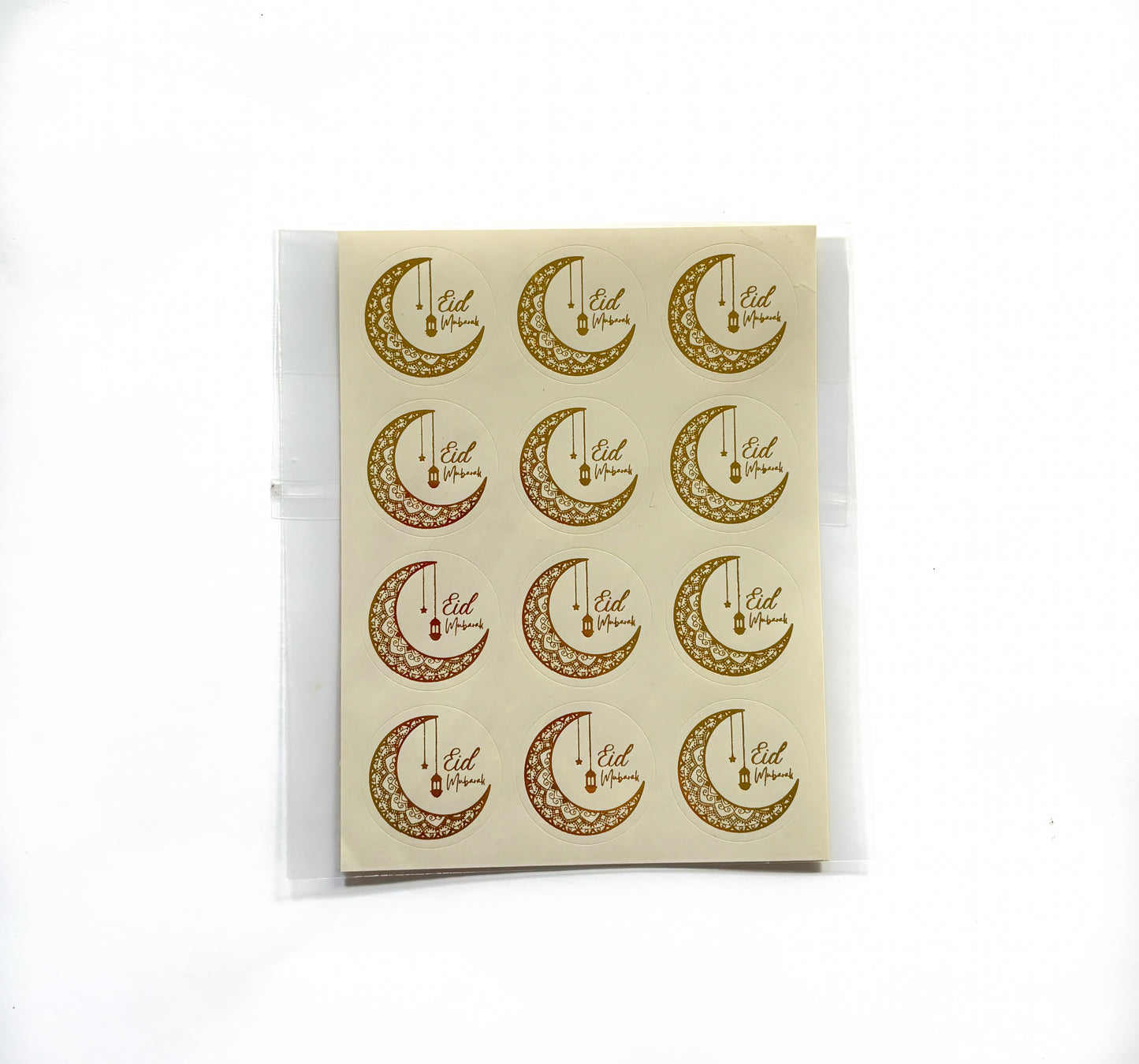 Islamic Eid stickers with gold designs and Eid Mubarak text
